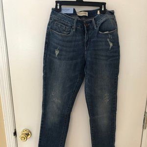 New, Lightly Distressed Skinny Jeans